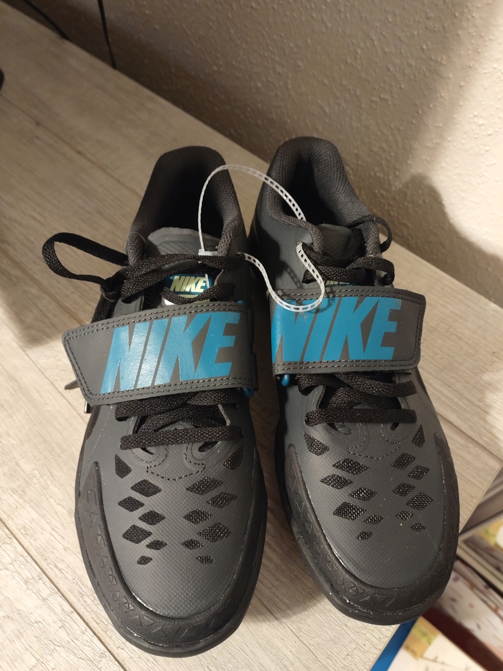 Nike Kids Black Sneakers with Blue NIKE Strap